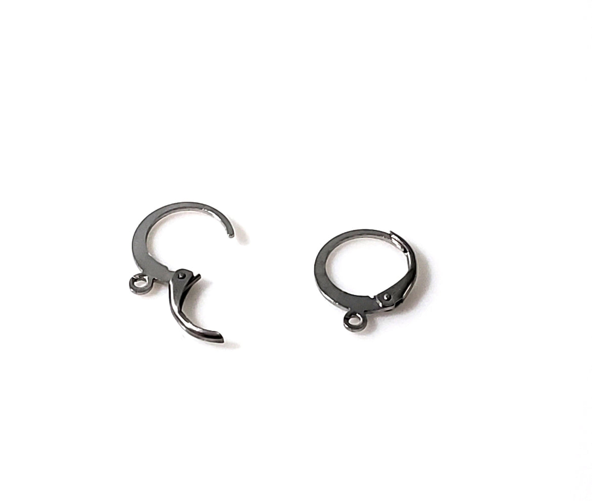 button blue shooting star studs