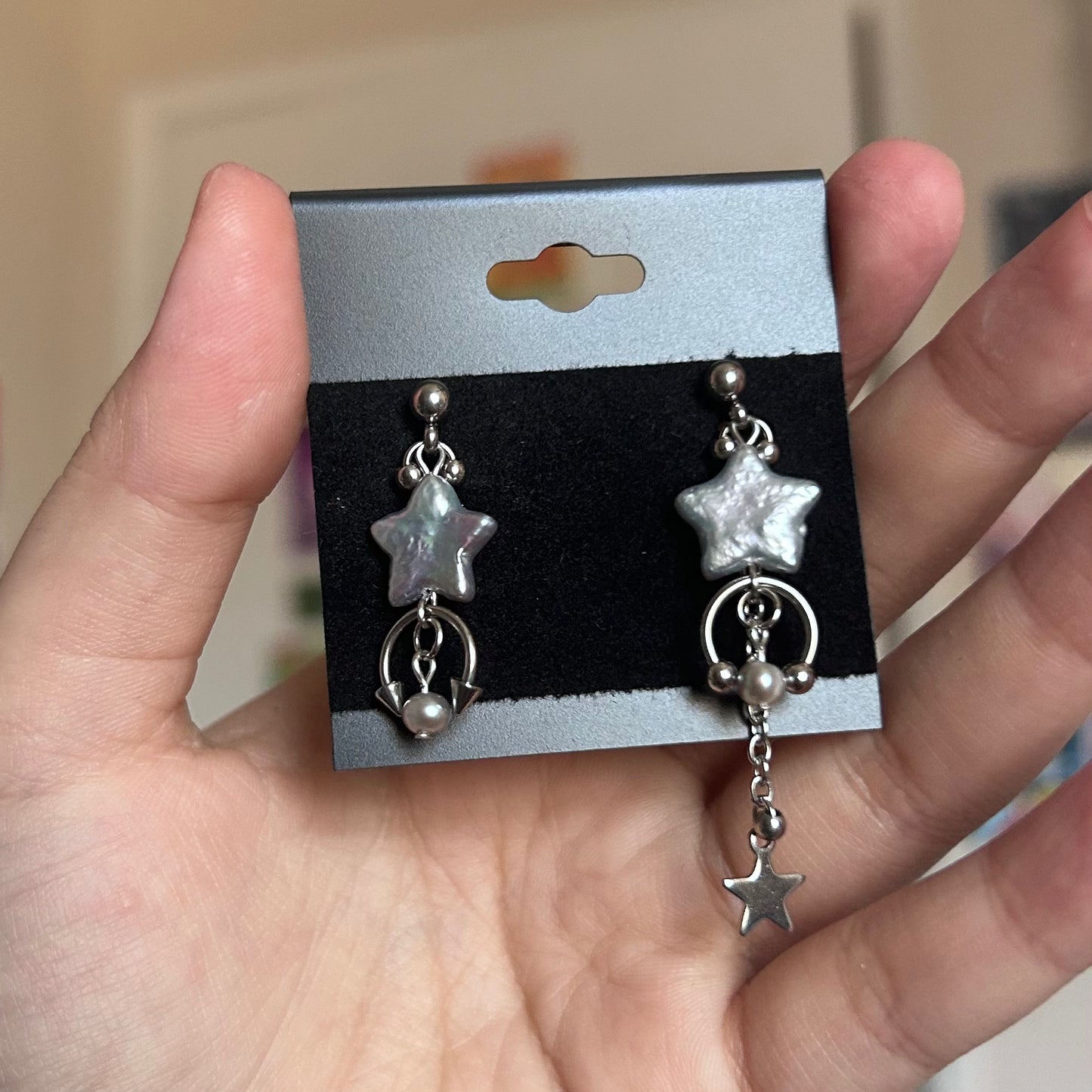 gray shooting star studs