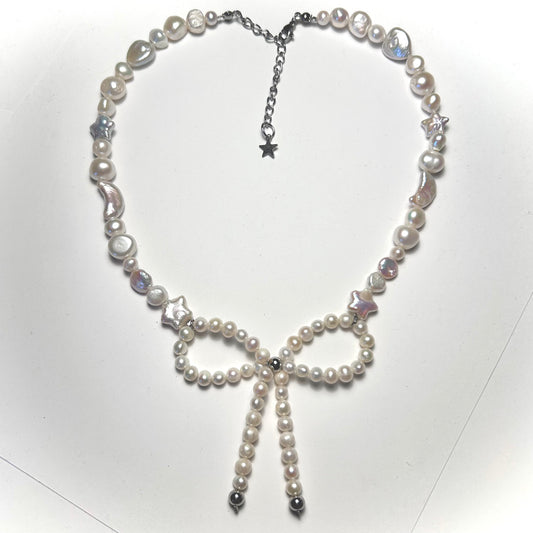 white bow pearl necklace