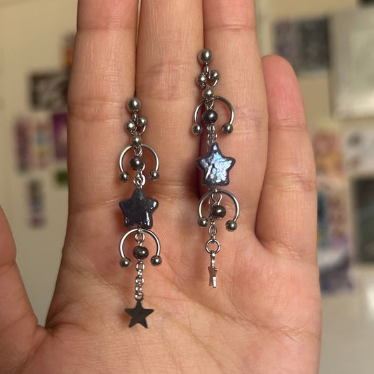 'veil' star studs (peacock)
