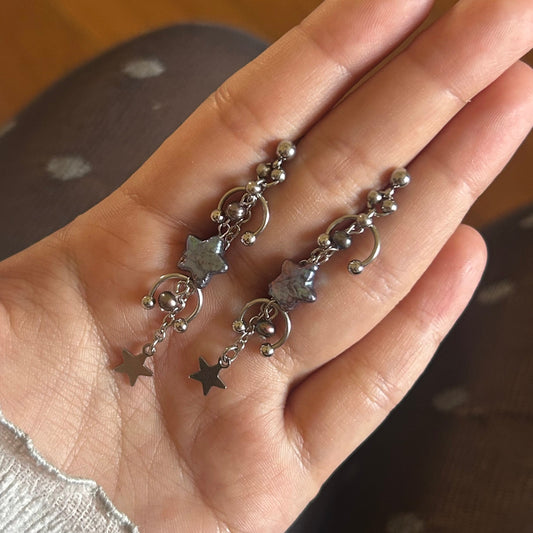 'veil' star studs (peacock)