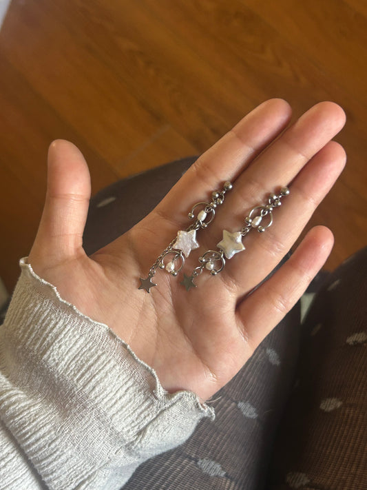 'veil' star studs (white)