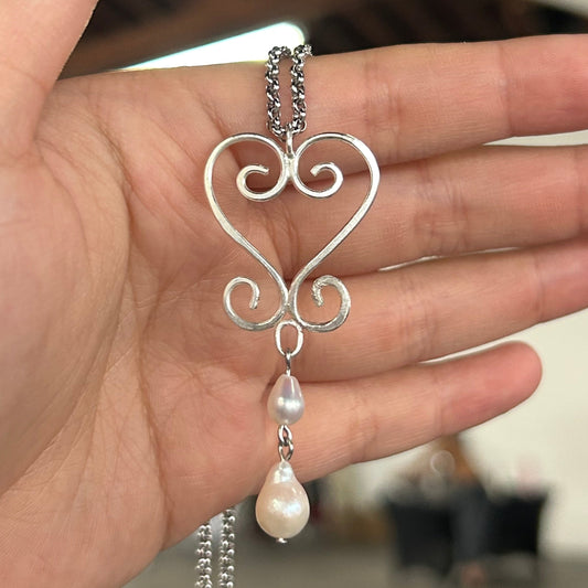 two steps forward pendant