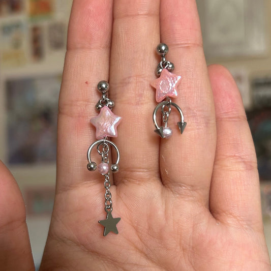 baby pink shooting star studs