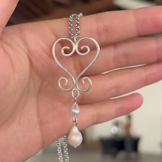 two steps forward pendant