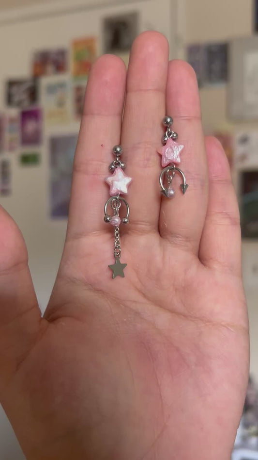 baby pink shooting star studs